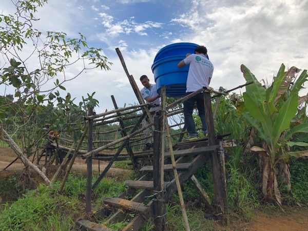 A water tank has been delivered to Lai as his house is without water supply.